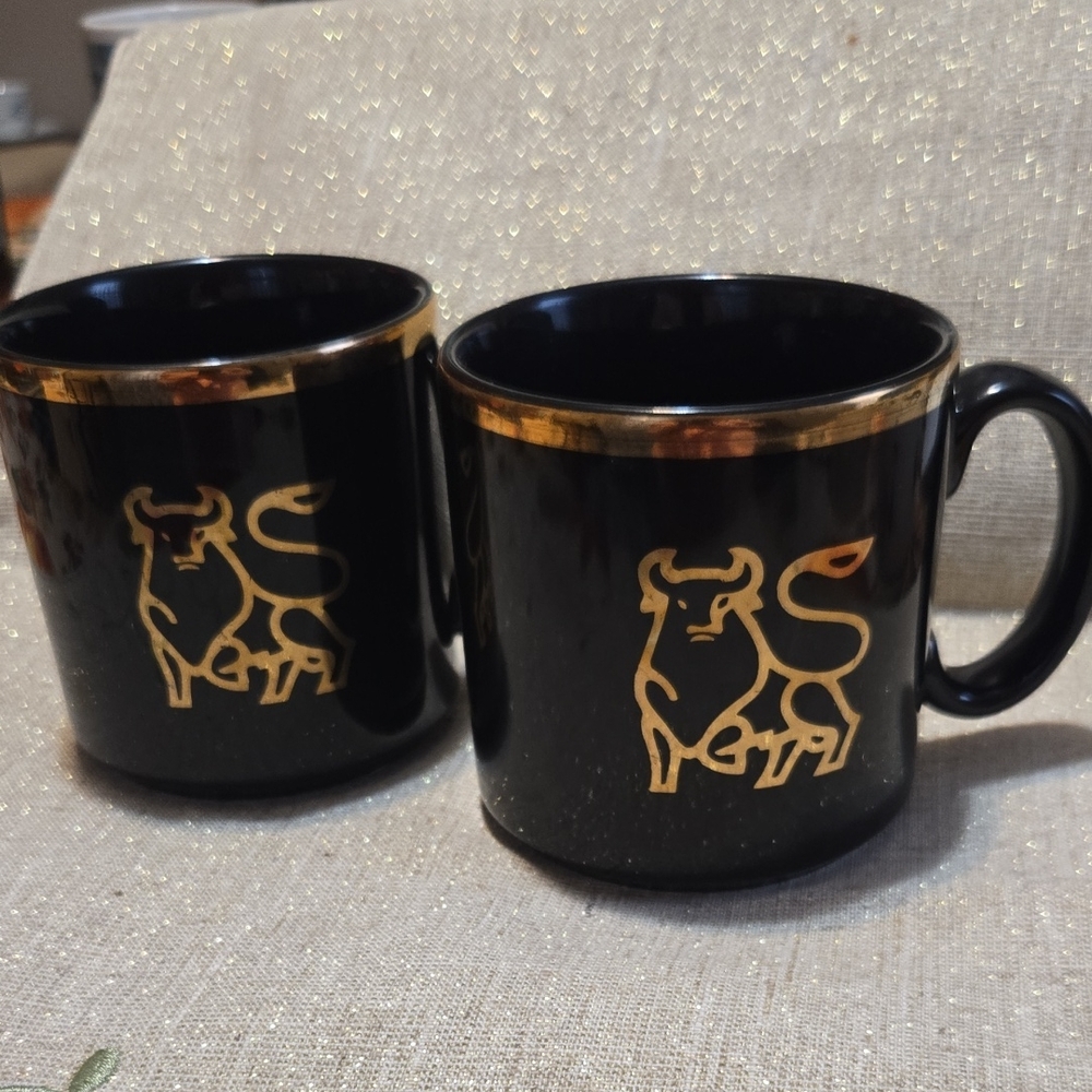 TAMS Made In England. TWO Black and Gold Bull Design Mugs
